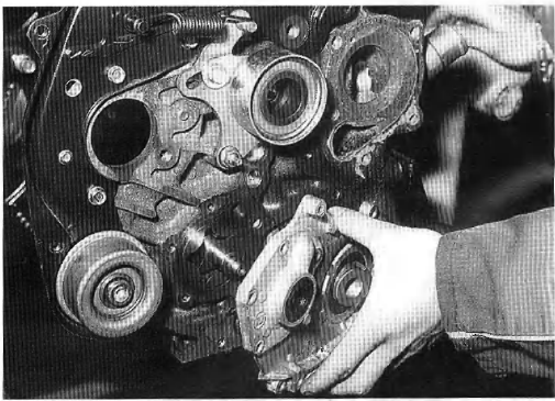 Opel Corsa. Depose de la plaque support au joint d'etancheite et la pompe ? huile
