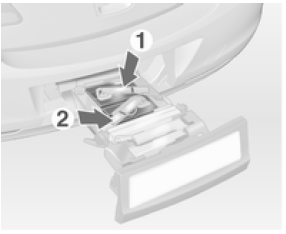 Replier les supports d'ampoules au dos des feux arrière.