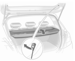 Soulever le cache-bagages vers l'arrière jusqu'à ce qu'il se déverrouille, puis