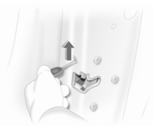 Introduire la clé dans l'ouverture audessus de la serrure à l'intérieur de la