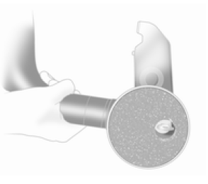 Lors de l'insertion, placer le capuchon de protection sur le bouton rotatif avec