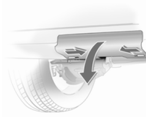 Pousser les deux loquets vers l'intérieur et enlever le cache du parechocs.