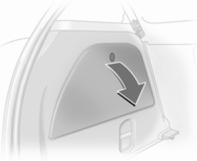 La boîte à fusibles se trouve sur le côté gauche du coffre, derrière un cache.