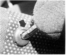 Bouton de déverrouillage de l'appuie tête